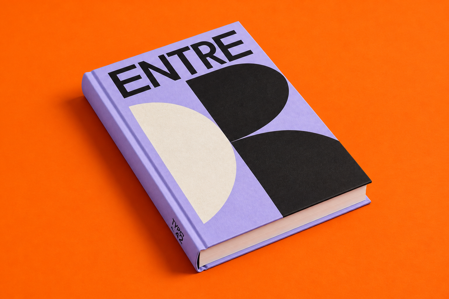 Entre: livro lilás com formas gráficas pretas e brancas, deitado sobre um fundo laranja.